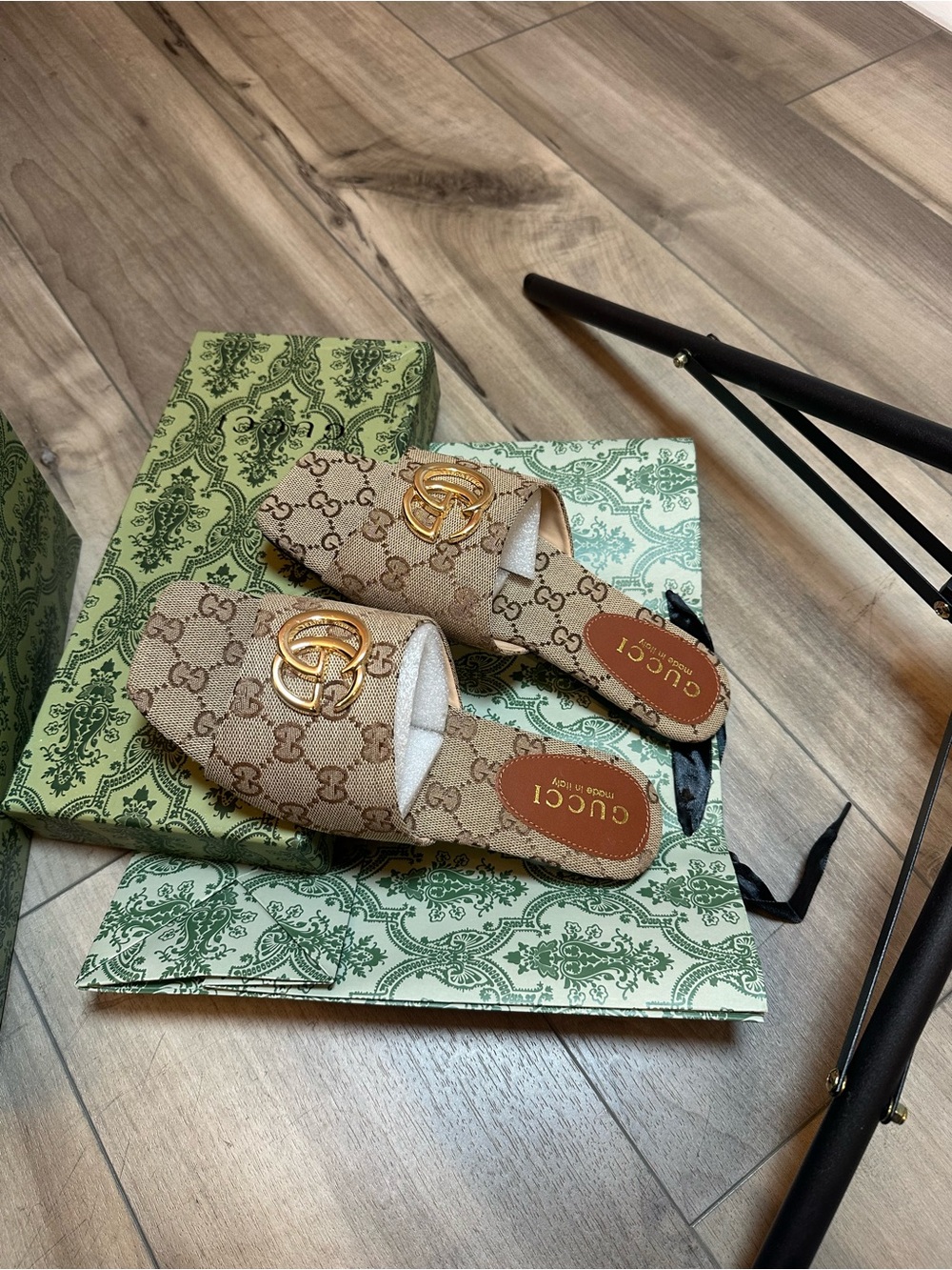 Gucci Beige GG Supreme Slide Mules with Gold Double G